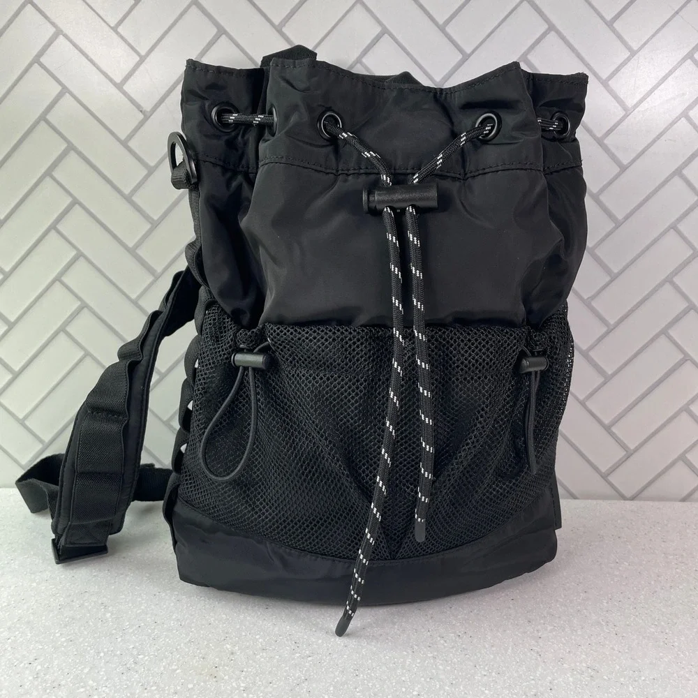 Dagne Dover Nova Sling Drawstring Crossbody Backpack Onyx Black Nylon Bucket Bag